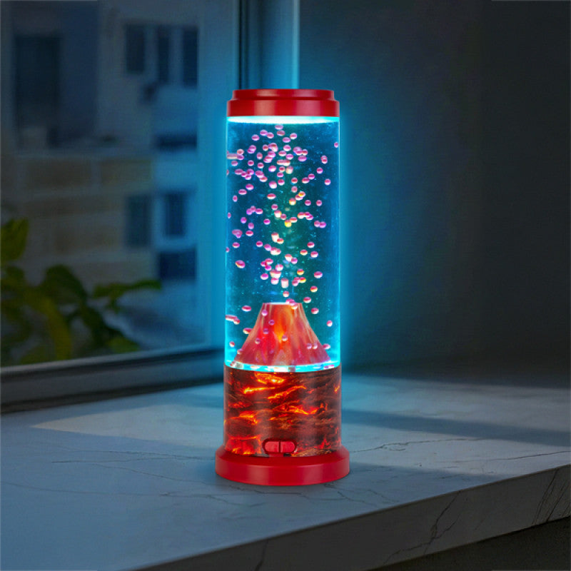 Colourful volcano lamp with red base and blue liquid on a surface.