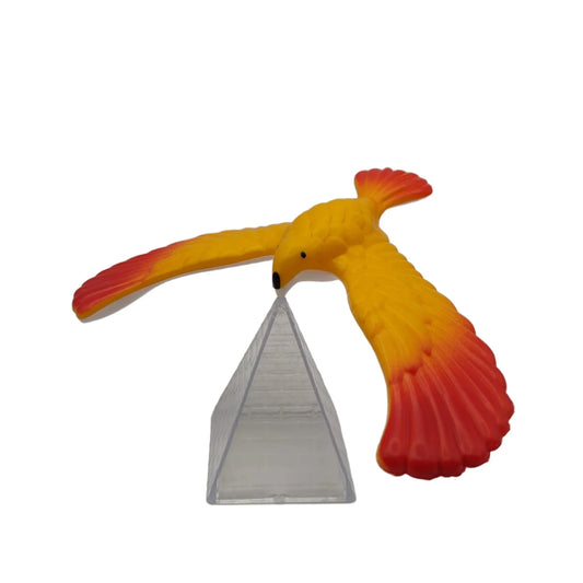 balance bird toy on pyramid base