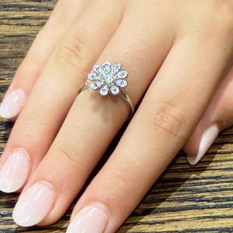 hand wearing sparkly diamante flower fidget ring