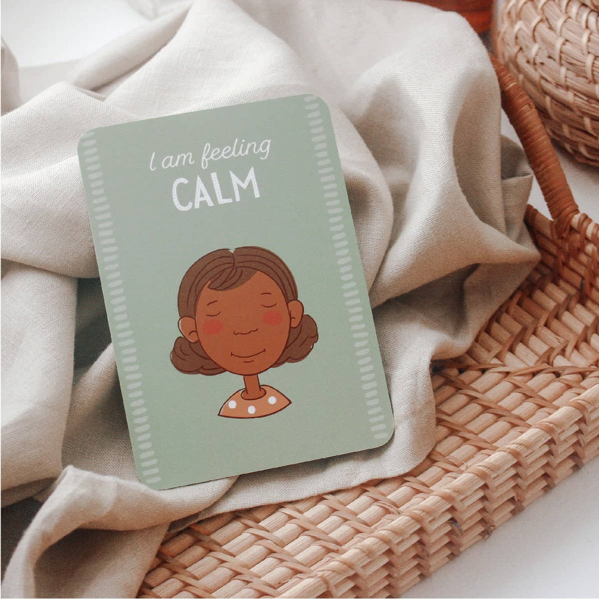 Creative Sprout Emotions Card with illustration of a person and 'I am feeling calm' text on a textured surface