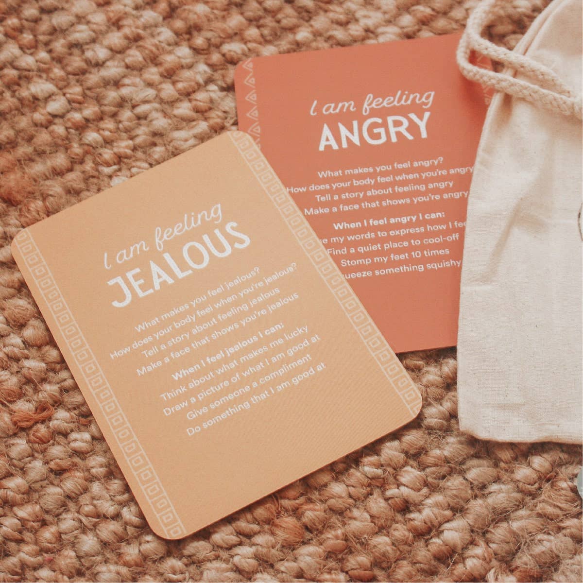 Two emotions cards 'I am feeling JEALOUS' and the other 'I am feeling ANGRY'.