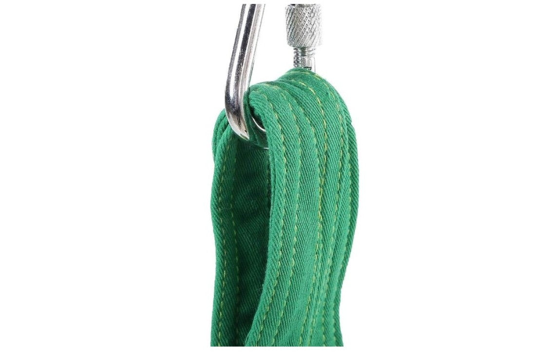 Green rope with metal carabiner on a white background