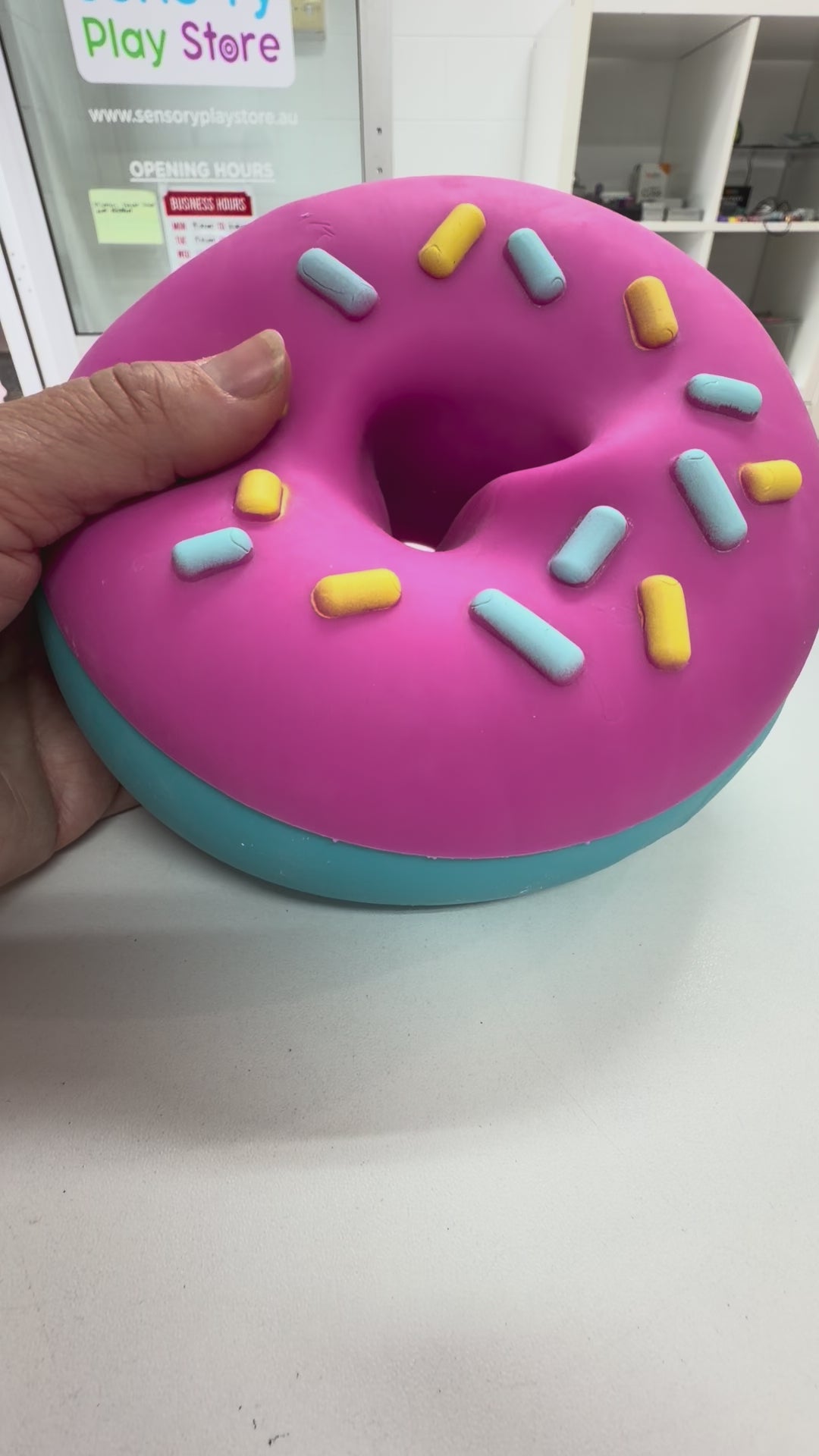 pealing the icing off the donut