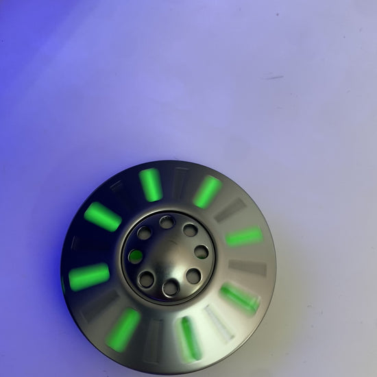 Video of UFO Spinner glowing under UV light 