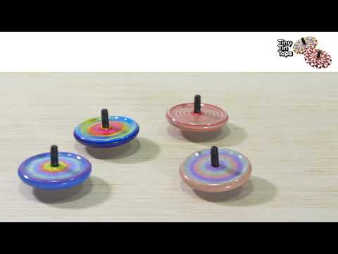 see the tiny tin spinning tops whirl in action